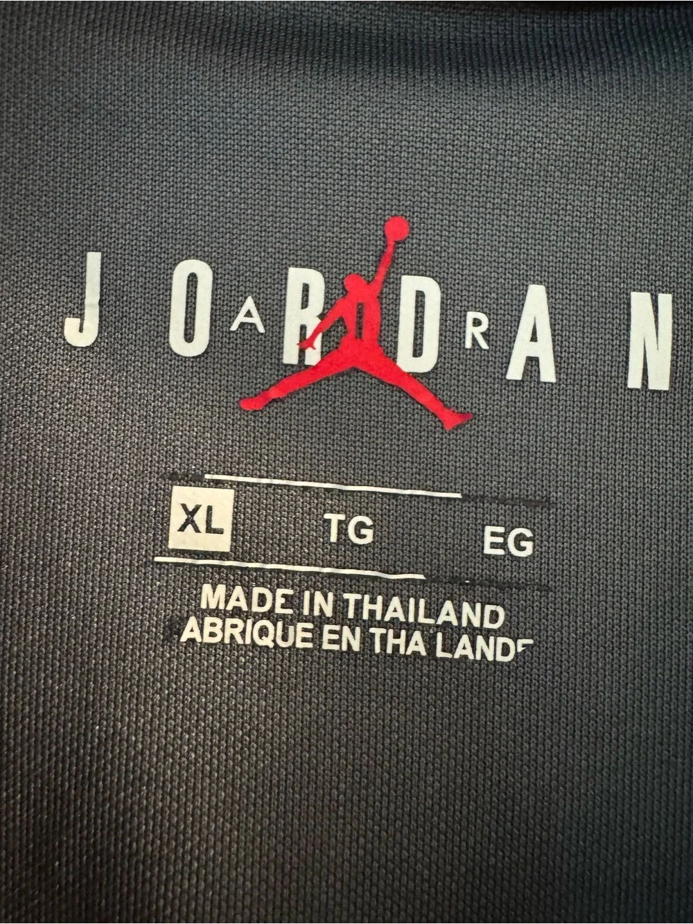 Jordan Men’s Black Jersey with Gold Logos and Pink Sleeve Detail